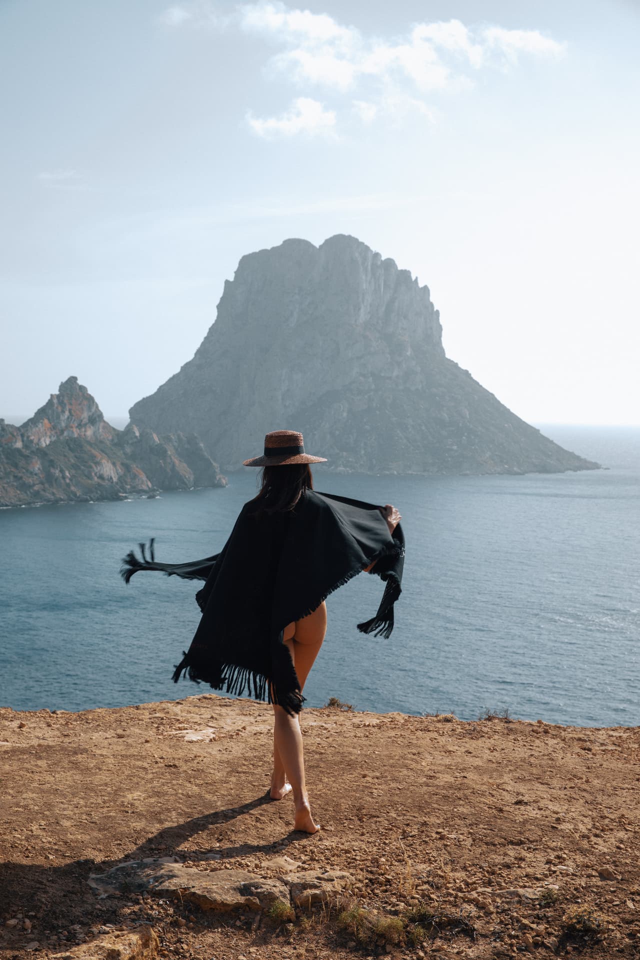 Natalie overlooking Es Vedra from the Ibiza coast